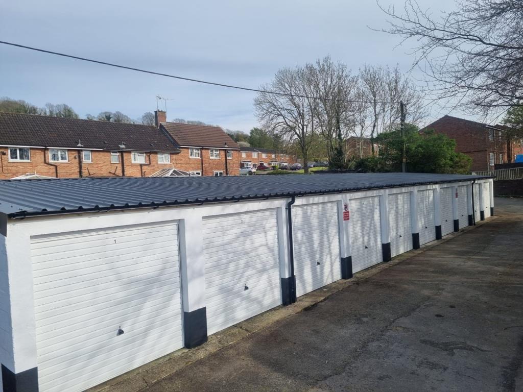 Lot: 114 - TEN REFURBISHED LOCK-UP GARAGES - General view of the 10 garages rear of 66 Pitman Place